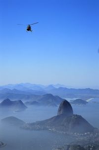Airplane flying over sea