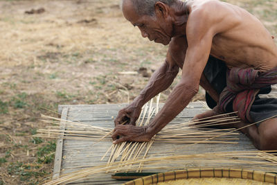 Senior man working outdoors