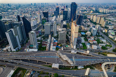 Aerial view of towers business area on business district , over urban junction
