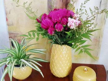 Close-up of flower vase on table