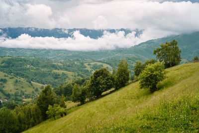 Scenic view of mountains and clouds