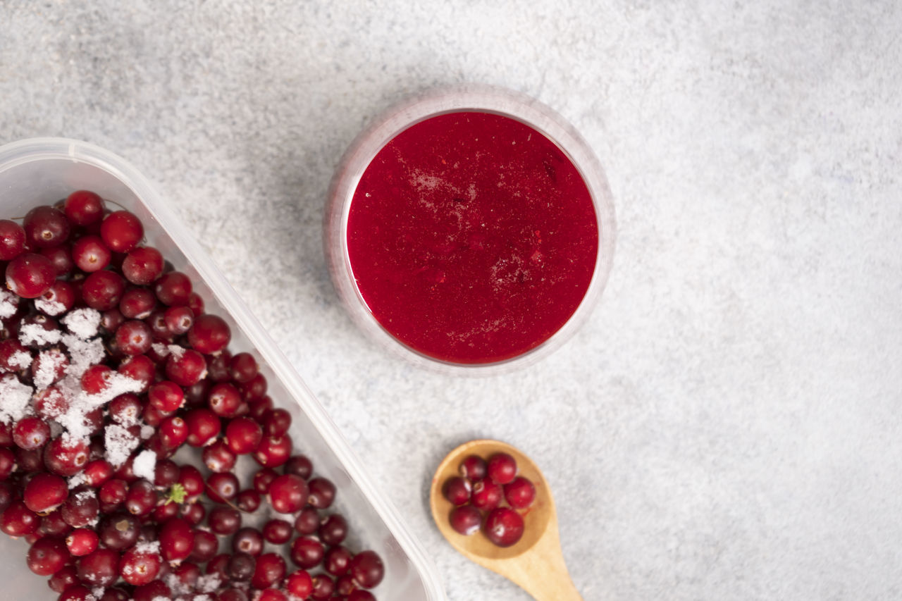 food and drink, food, red, fruit, healthy eating, wellbeing, freshness, produce, berry, studio shot, high angle view, no people, indoors, bowl, plant, directly above, seed, pomegranate, still life, close-up, raspberry, sweet food