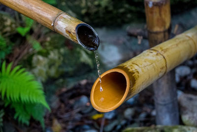 Close-up of water falling from pipe