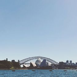 View of bridge over sea against clear sky