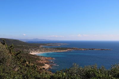 Scenic view of sea against blue sky