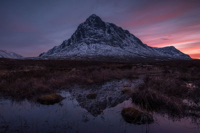 Scenic view of mountain against sky during sunset