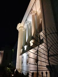 Low angle view of illuminated building at night