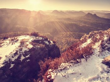 High angle view of snowcapped mountains against sky