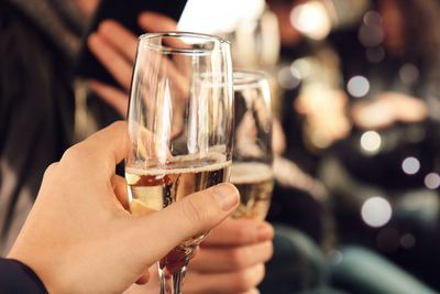 Close-up of hand holding wine glass