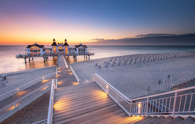 Famous sellin seebruecke sellin pier in beautiful golden morning light at sunrise in summer