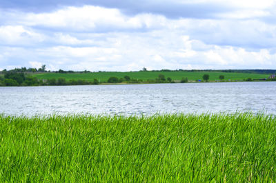 Scenic view of river against sky