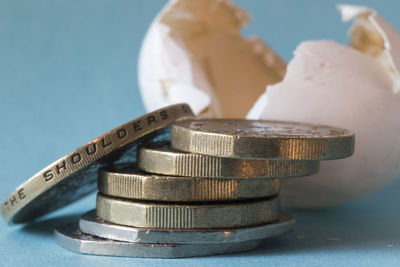 Close-up of coins on table