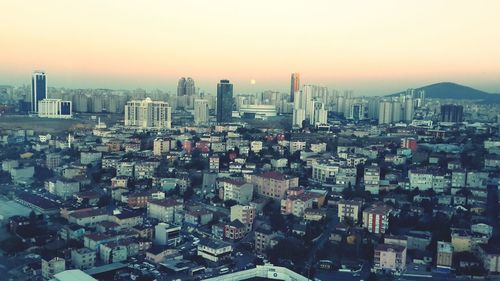 High angle view of cityscape against sky during sunset