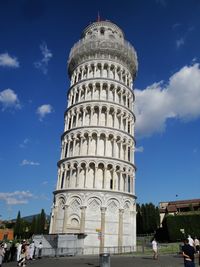 Low angle view of historical building against cloudy sky