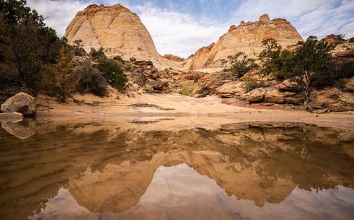 Scenic view of rock formations against sky