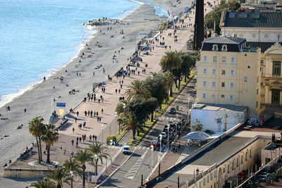 High angle view of street by buildings in city