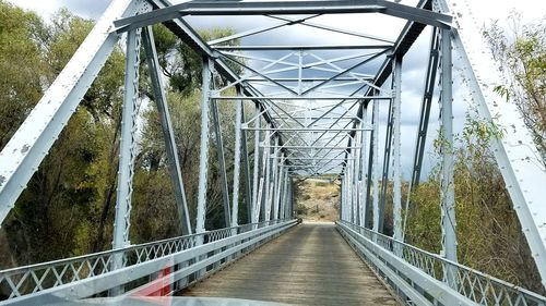 Footbridge amidst trees