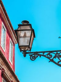 Low angle view of street light against clear sky
