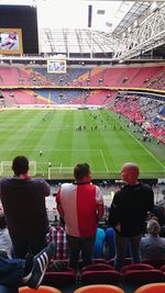 Group of people in stadium