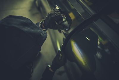 Close-up of man holding bicycle