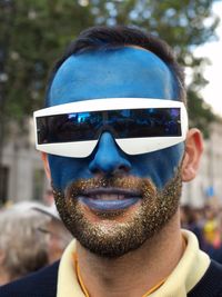 Portrait of young man wearing sunglasses