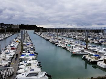 High angle view of boats moored at harbor