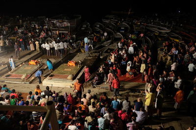 High angle view of crowd at music concert at night