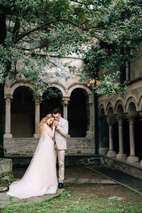 Woman in front of building