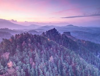 Scenic view of mountains against sky during sunset