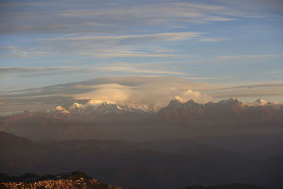 Scenic view of mountains against sky during sunset