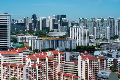 High angle view of buildings in city against sky. singapore residential neighborhood 