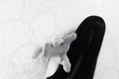 Midsection of woman holding hands