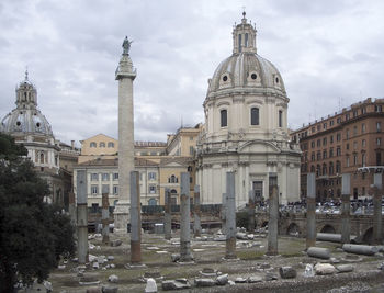 View of buildings in city against sky