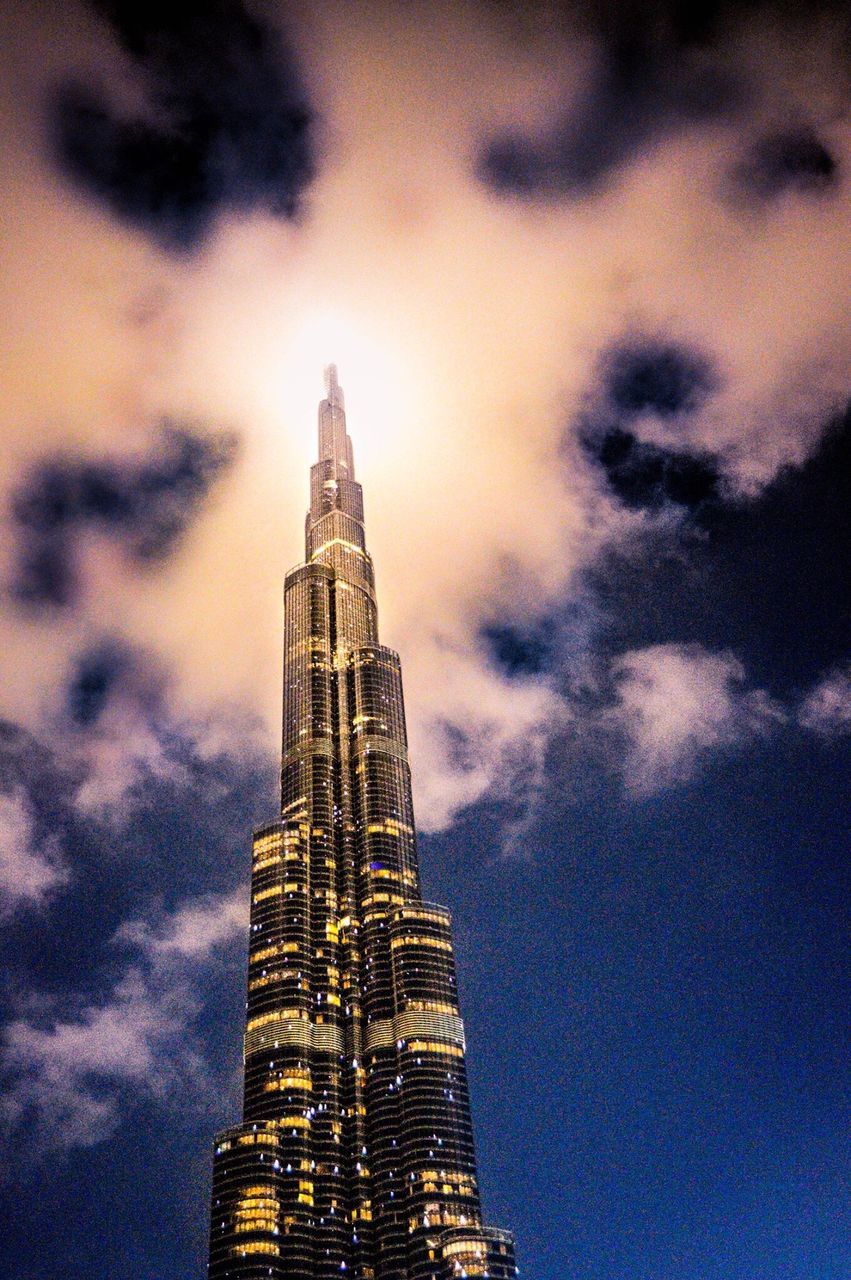 LOW ANGLE VIEW OF TOWER AGAINST CLOUDY SKY