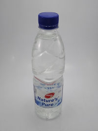 Close-up of water bottle against white background