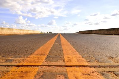 Surface level of road against sky