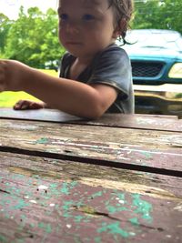 Full length of cute girl playing on field