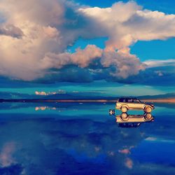 Boat in sea against sky