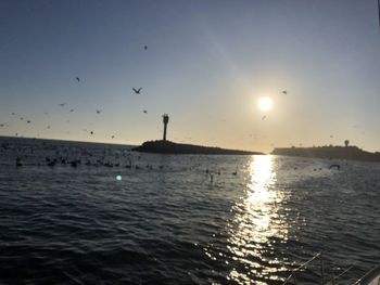 Scenic view of sea against sky during sunset