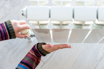 High angle view of woman holding hands