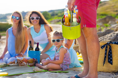 Rear view of women wearing sunglasses