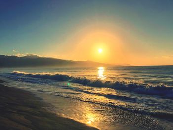 Scenic view of sea against sky during sunset