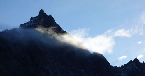 Low angle view of mountains against sky