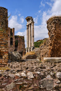 Old ruin building against cloudy sky