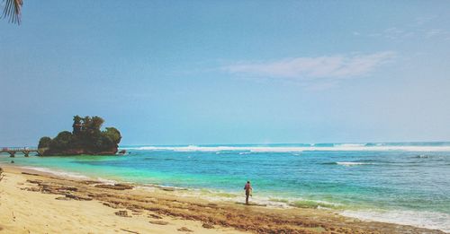 Scenic view of beach against sky