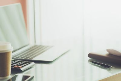 Man using laptop on table