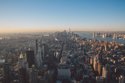 Aerial view of city at sunset