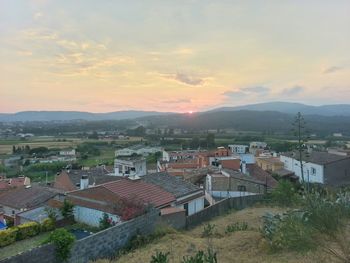 View of cityscape at sunset