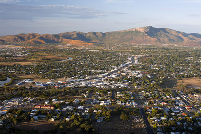 High angle view of buildings in city against sky
