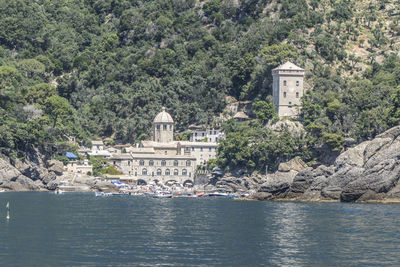 The beautiful bay of san fruttuoso with green water and an abbey near the beach